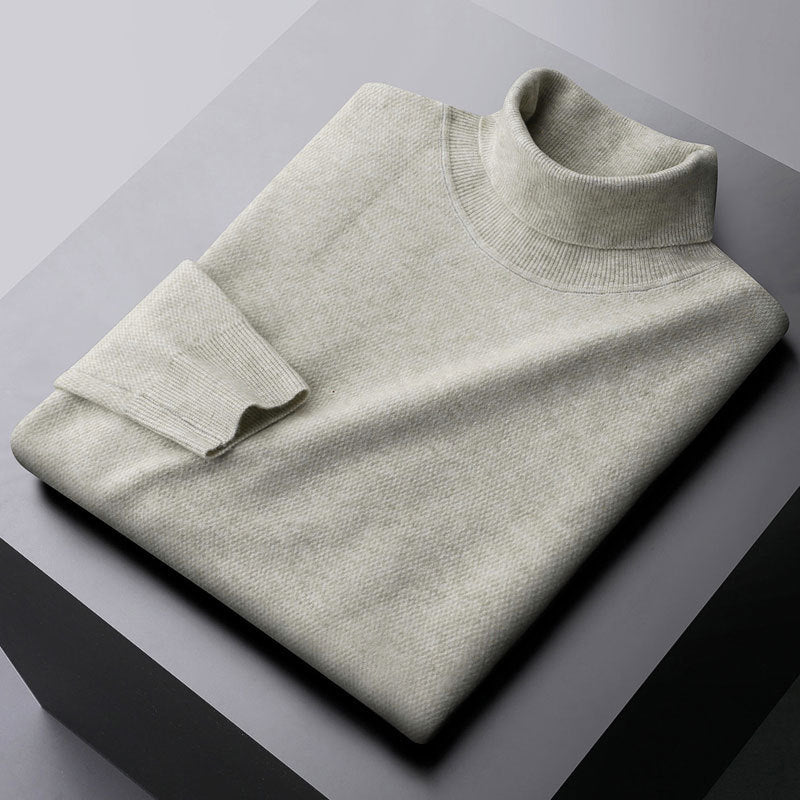 Elegant knit dress with a high collar and ribbed cuffs