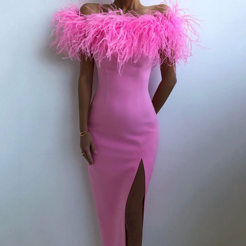 Elegant evening gown with feather lace and a figure-hugging cut