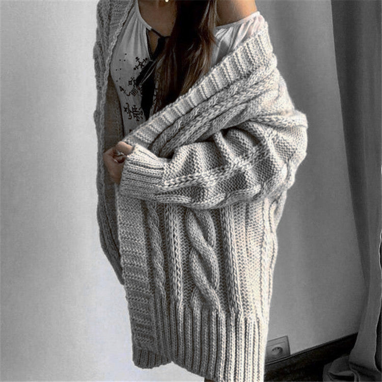 Oversized cable knit V-neck wool dress