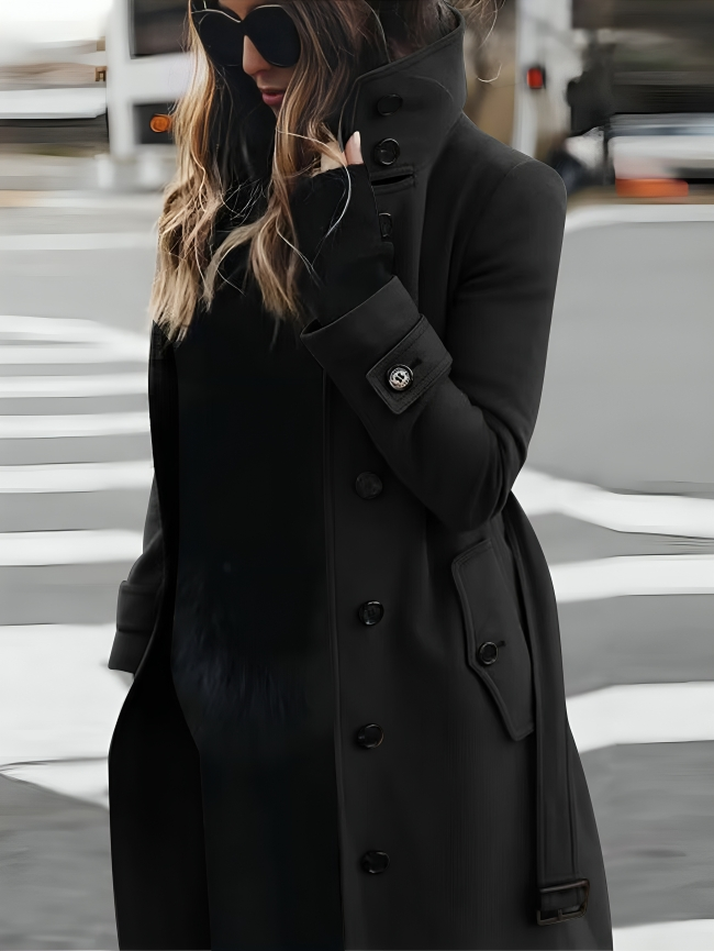 Elegant long women's coat with high collar and belt