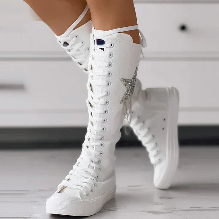 Stylish lace-up boots with tassel detail
