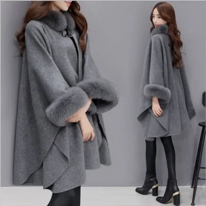 Elegant women's cape jacket with faux fur trim