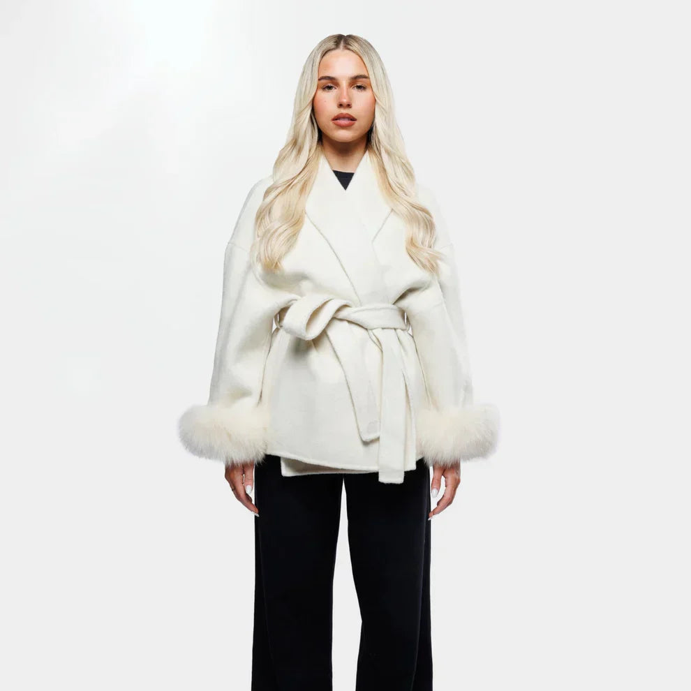 Elegant wool jacket with belt and faux fur cuffs