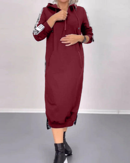 Practical dress with zipper and hood