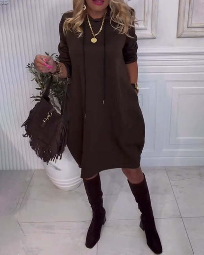Practical plain-colored dress with hood