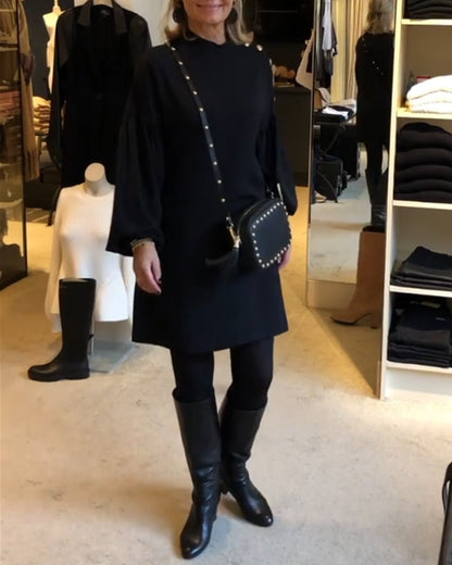 Black evening dress with puff sleeves
