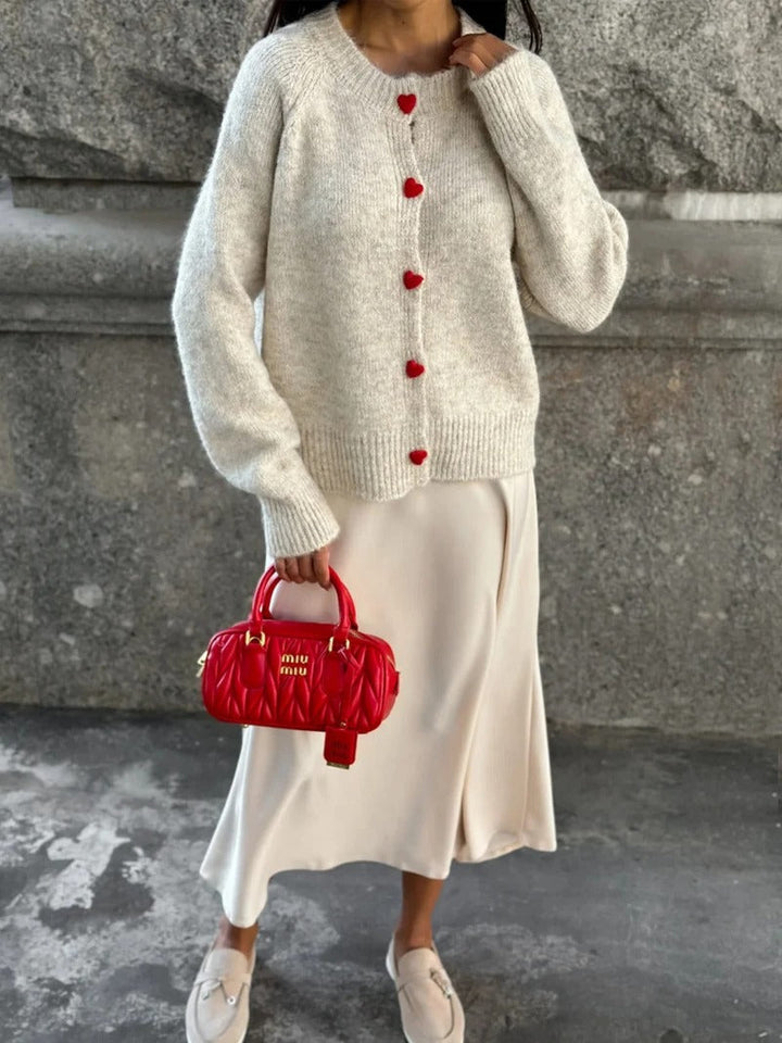 Soft knitted top with heart buttons for women