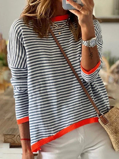 Navy blue women's top with stripes and orange accents