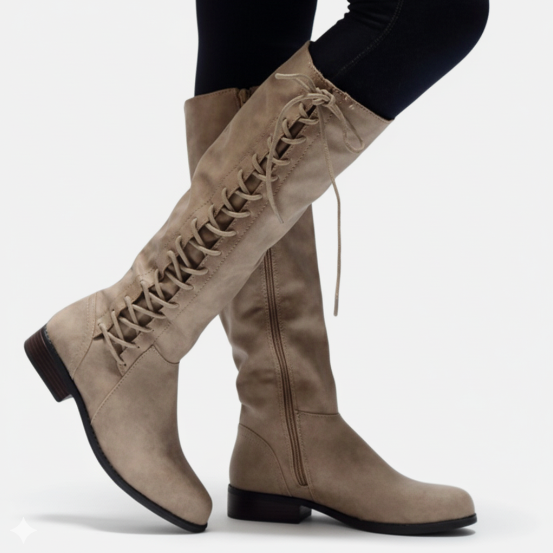 Knee-high faux leather boots with criss-cross lacing