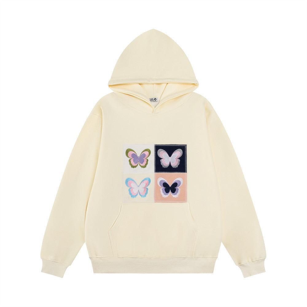 Elegante Frauenkleidung mit Stickerei Schmetterling