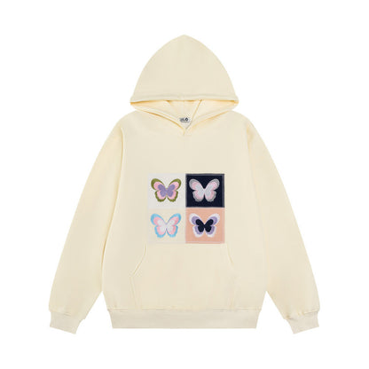 Elegante Frauenkleidung mit Stickerei Schmetterling