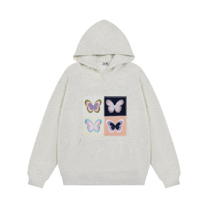 Elegante Frauenkleidung mit Stickerei Schmetterling