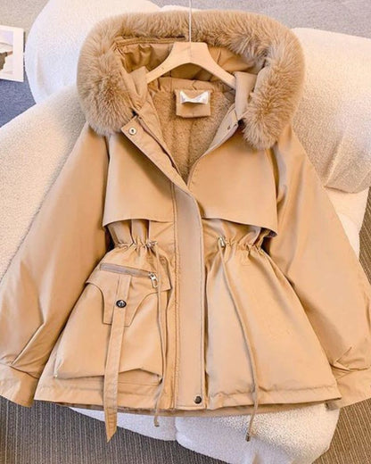 Elegant women's coat with faux fur collar