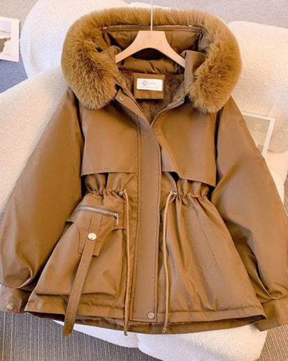 Elegant women's coat with faux fur collar