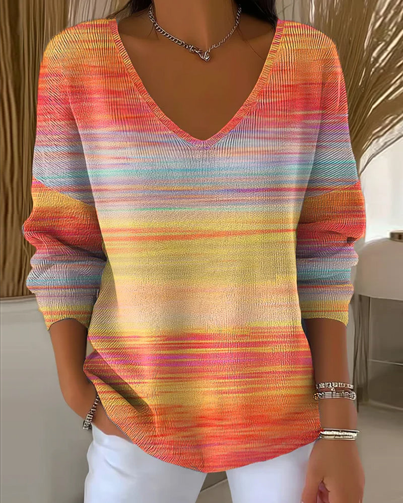 Colorful women's sweaters with rainbow pattern