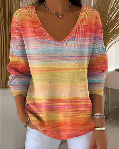 Colorful women's sweaters with rainbow pattern