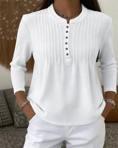 Elegant women's dress with pleats and buttons
