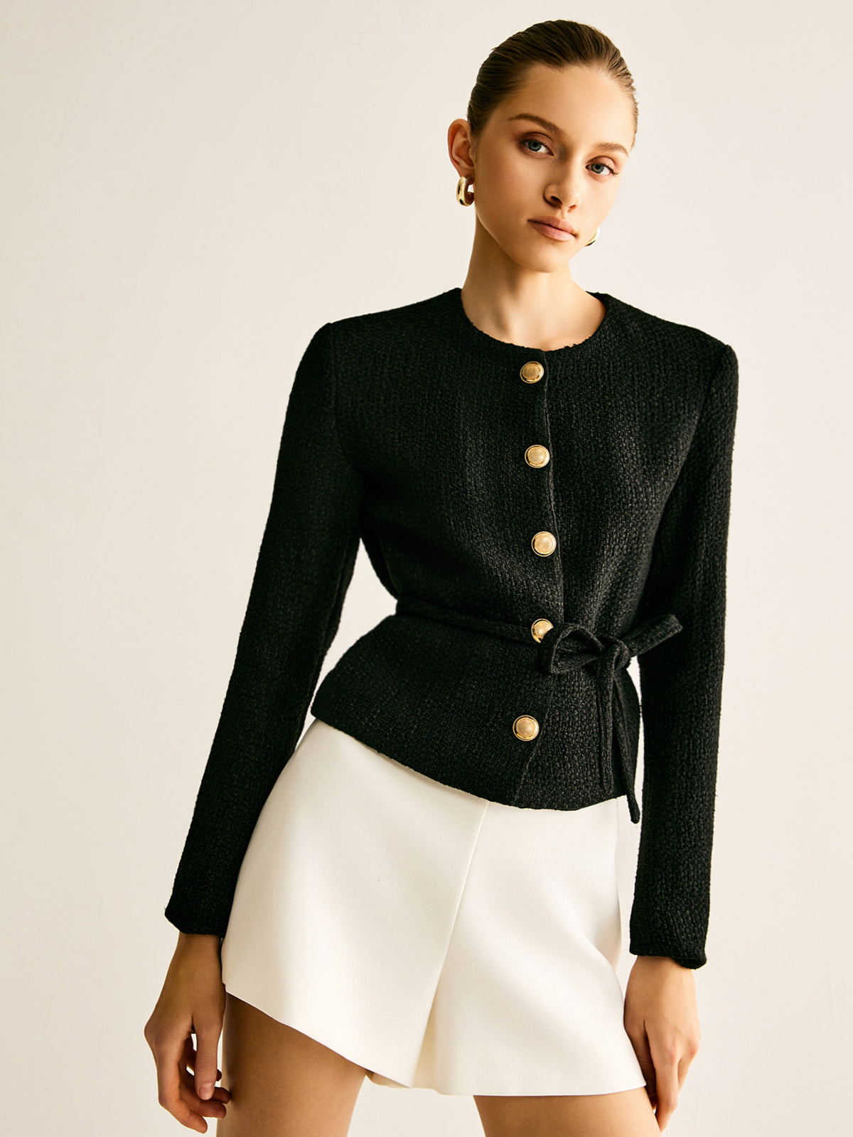 Fashionable button-up jacket with belt detailing