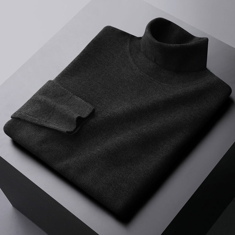 Elegant knit dress with a high collar and ribbed cuffs