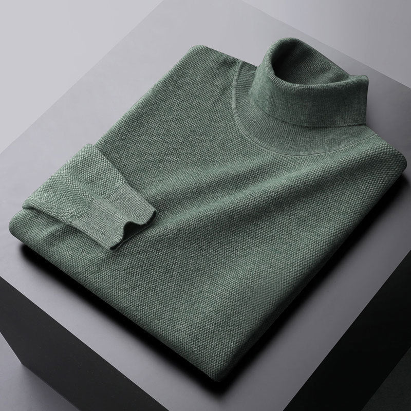 Elegant knit dress with a high collar and ribbed cuffs