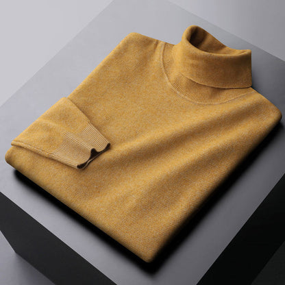 Elegant knit dress with a high collar and ribbed cuffs