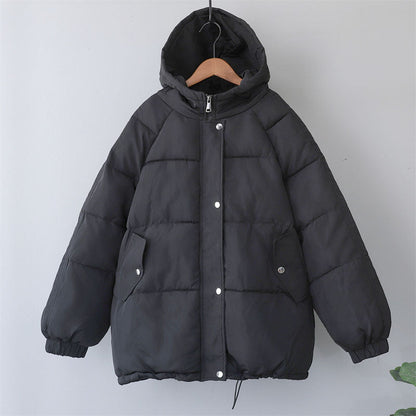 Women's warm winter jacket with hood and pockets
