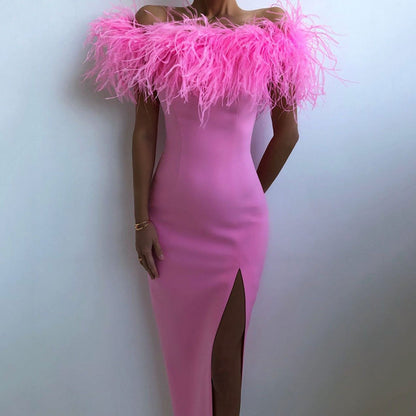 Elegant evening gown with feather lace and a figure-hugging cut