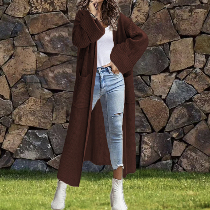 Women's Oversized Knit Cardigan with Pockets and Asymmetric Shoulders