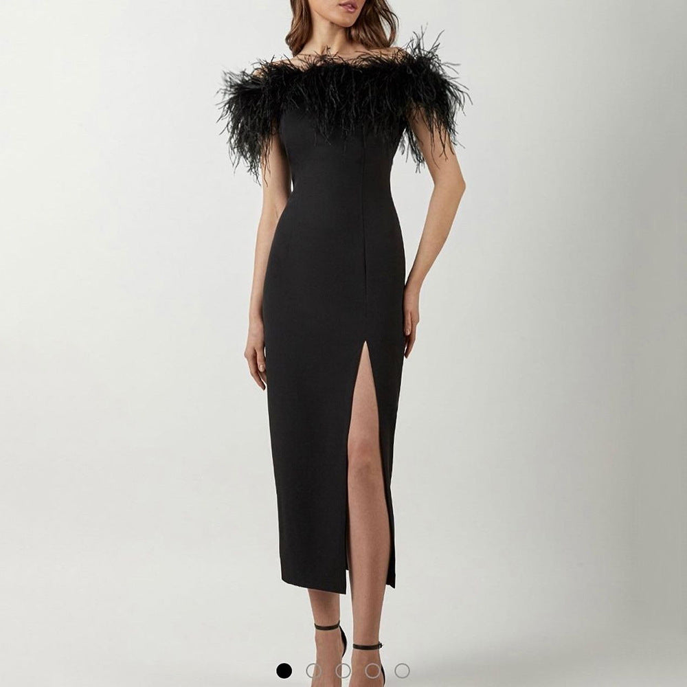 Elegant evening gown with feather lace and a figure-hugging cut