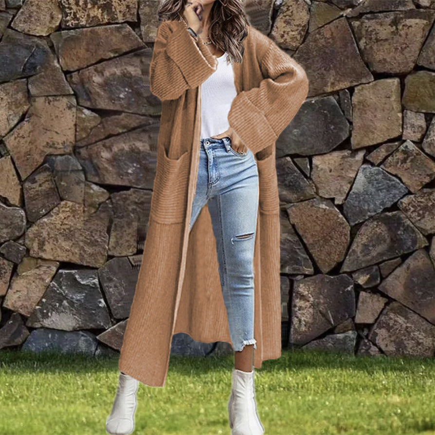Women's Oversized Knit Cardigan with Pockets and Asymmetric Shoulders