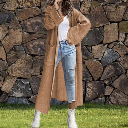 Women's Oversized Knit Cardigan with Pockets and Asymmetric Shoulders
