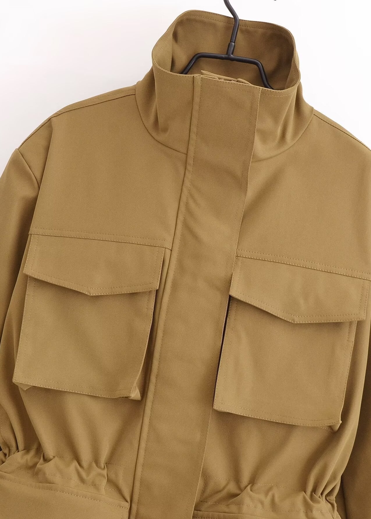 Practical outdoor jacket with functional pockets