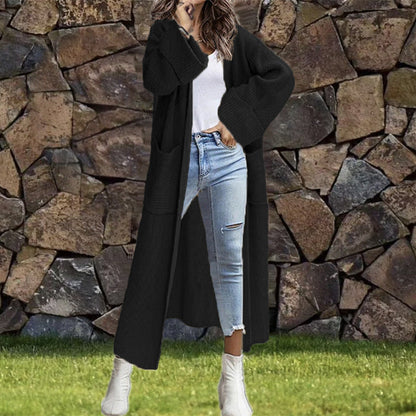 Women's Oversized Knit Cardigan with Pockets and Asymmetric Shoulders