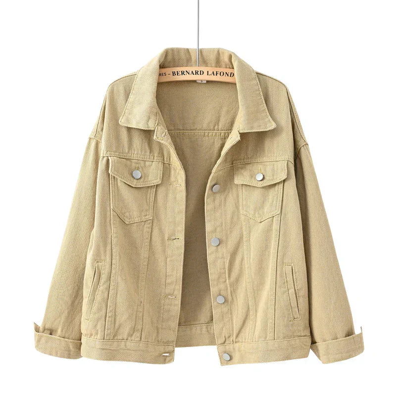 Short women's jacket with buttons and breast pocket