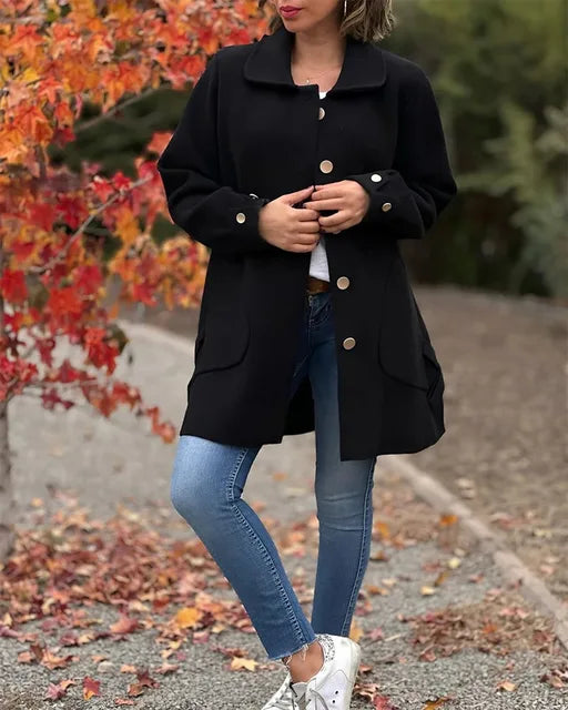 Stylish women's coat with modern buttons
