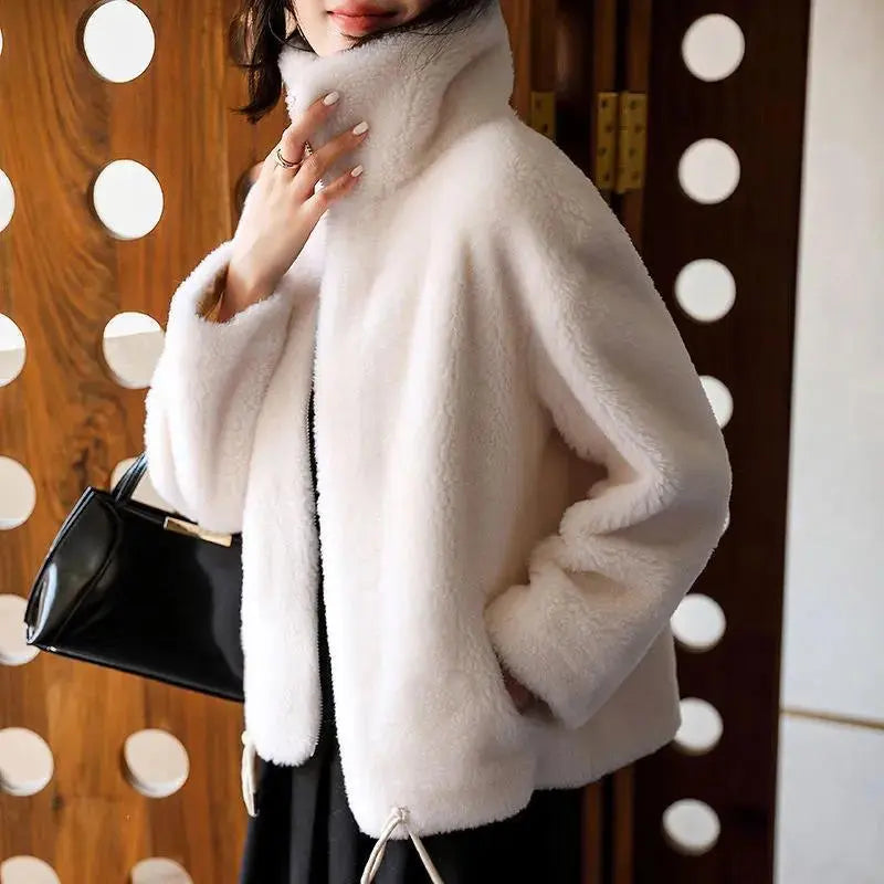 Fashionable women's quilted jacket with a stand-up collar
