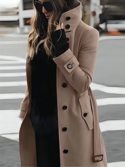 Elegant long women's coat with high collar and belt