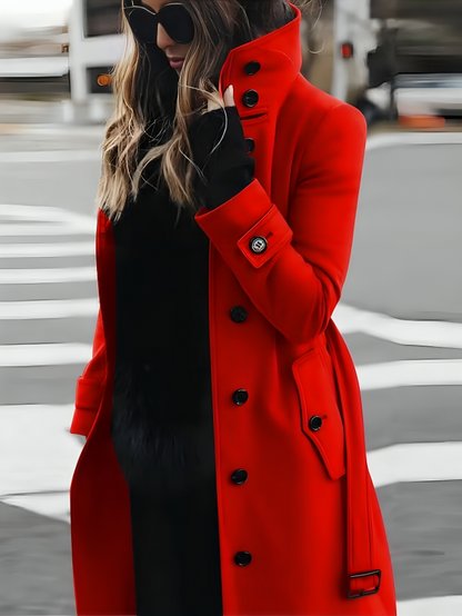 Elegant long women's coat with high collar and belt