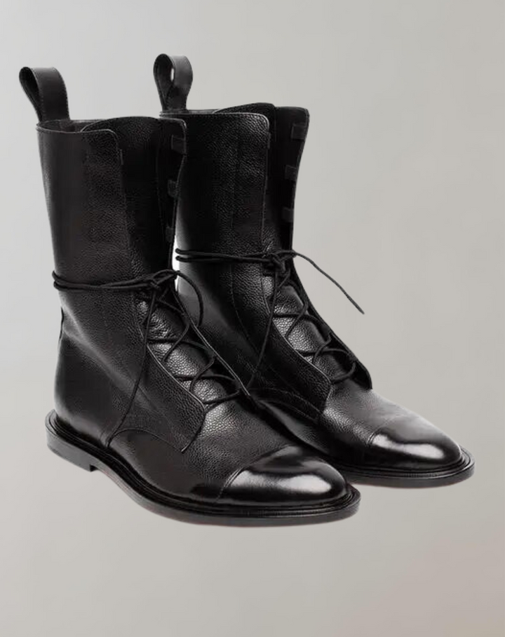 Stylish women's boots made of glossy patent leather