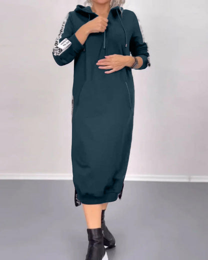 Practical dress with zipper and hood