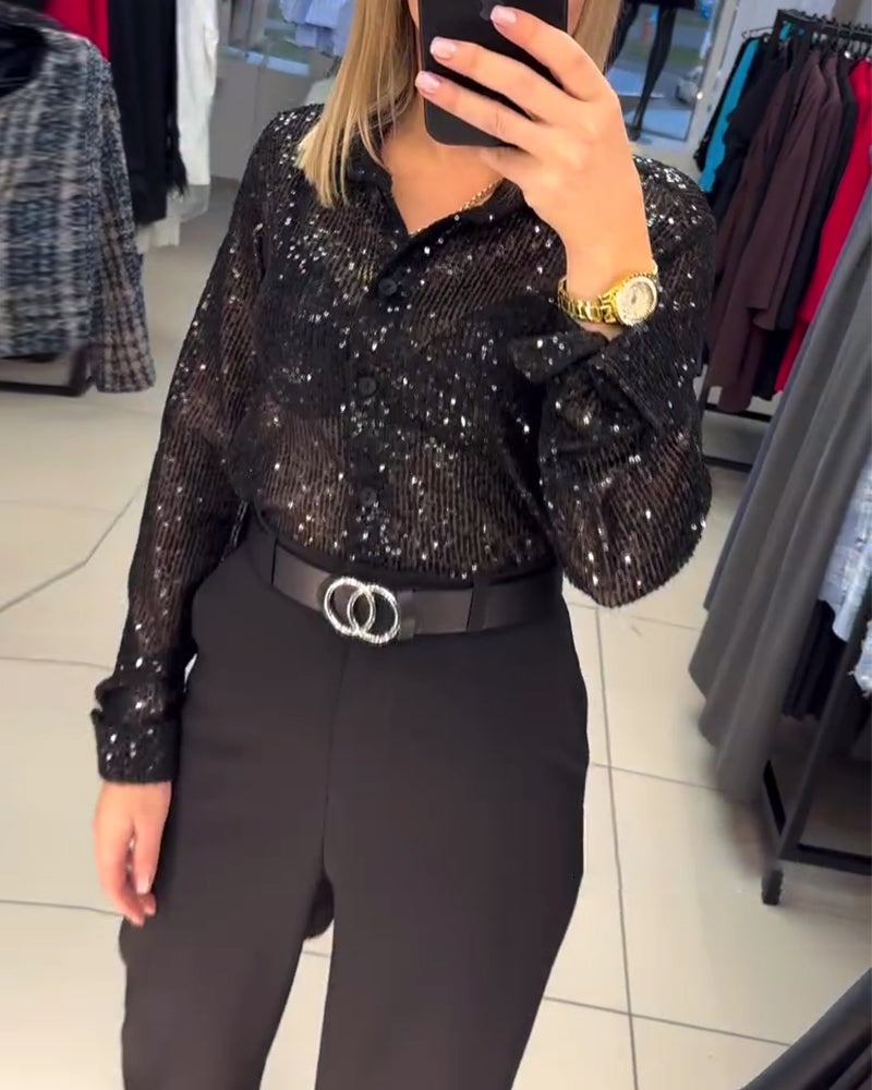 Elegant blouse with sequins and lapels