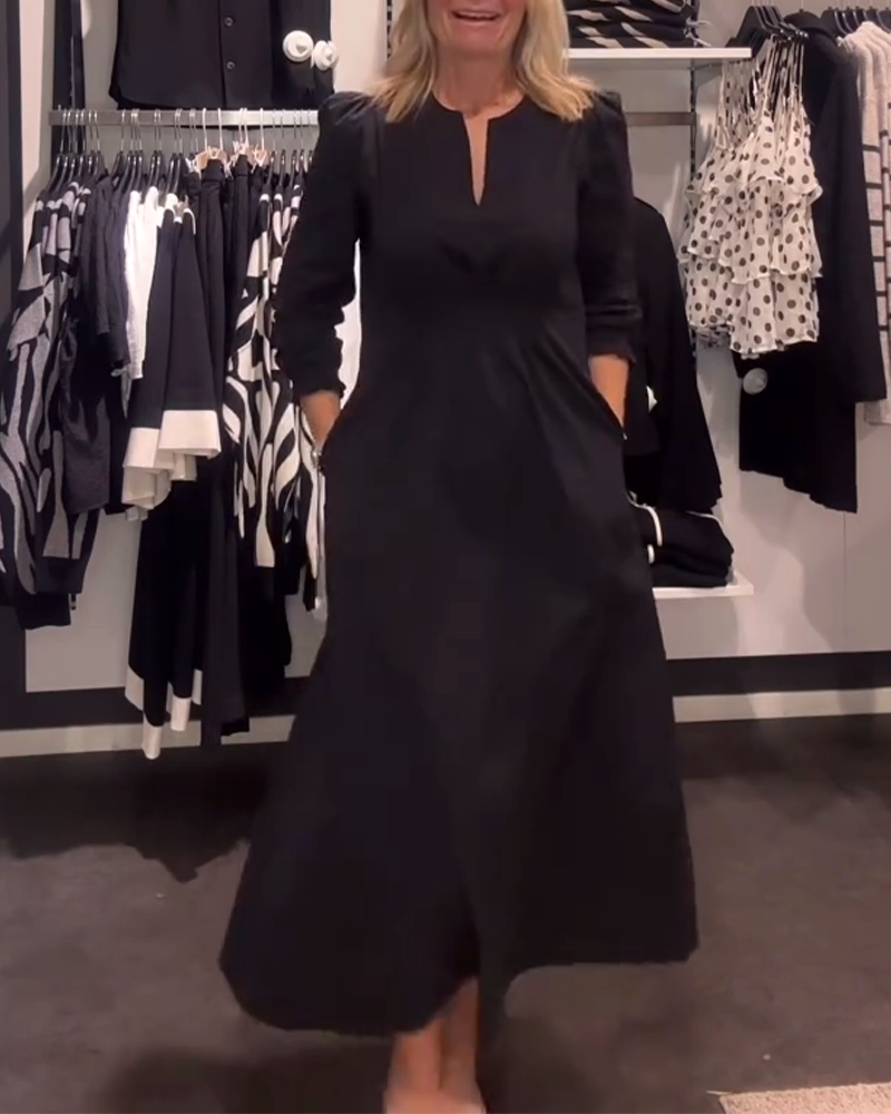 Elegant women's dress with puff sleeves and waist