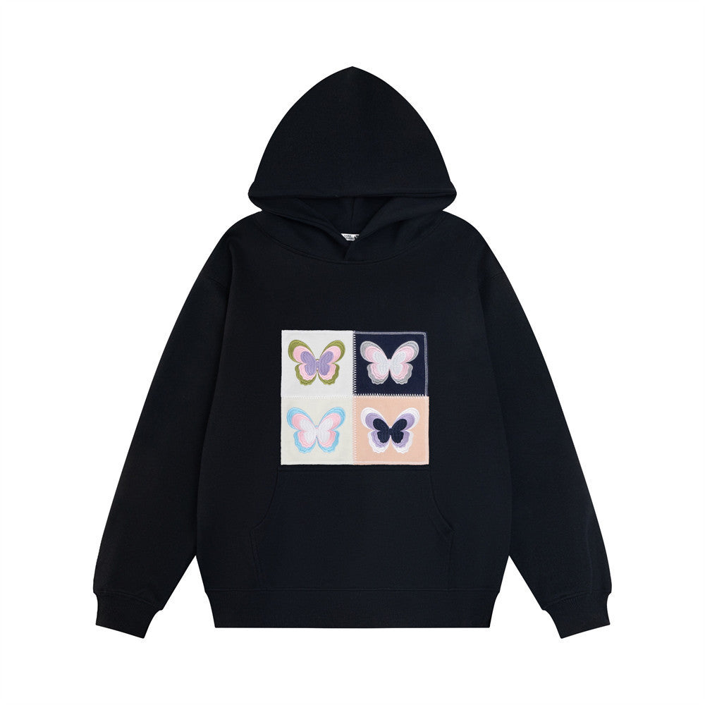 Elegante Frauenkleidung mit Stickerei Schmetterling