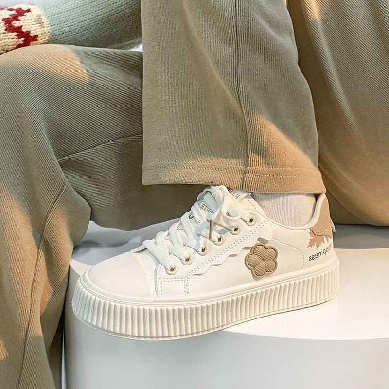 Fashionable women's sneakers with a floral pattern and chunky soles