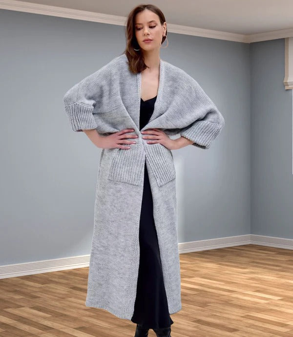 Oversized knitted coat with V-neck and pockets