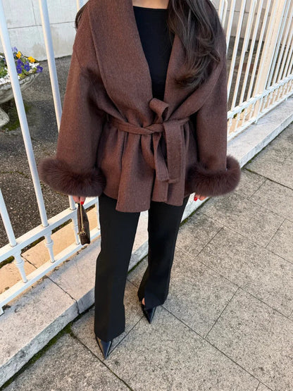 Stylish wool coat with belt and faux fur details
