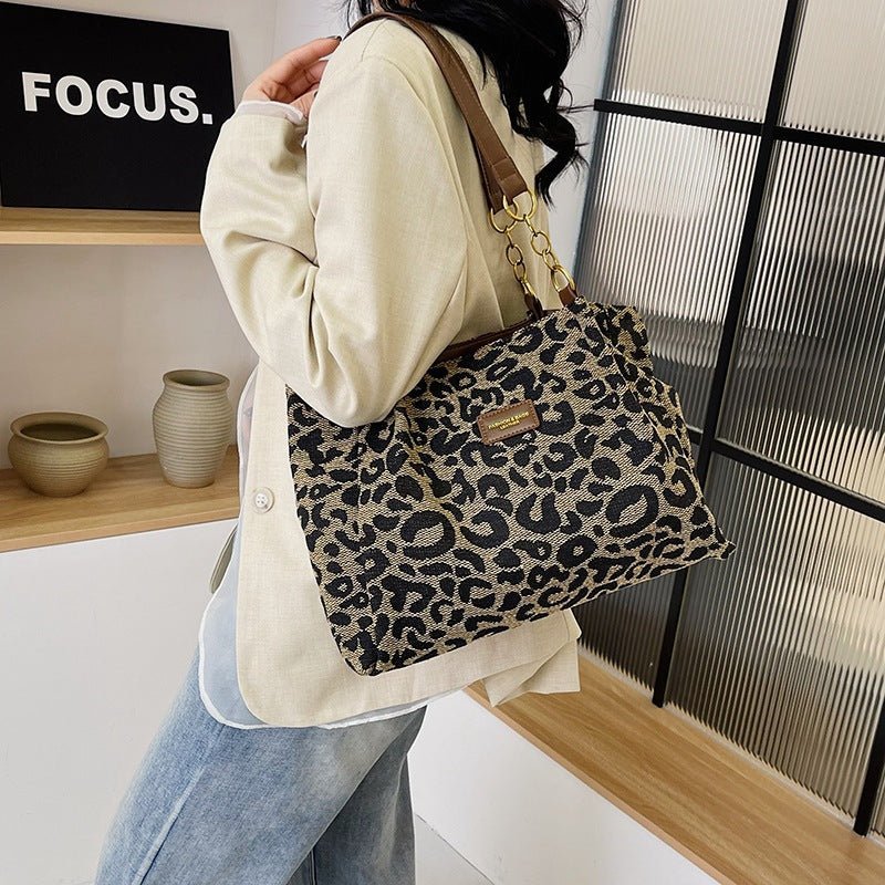 Stylish leopard print bag with faux leather handles