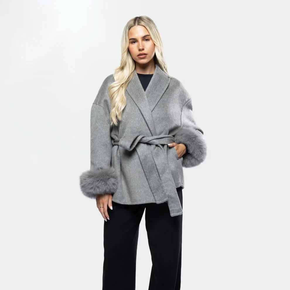 Elegant wool jacket with belt and faux fur cuffs