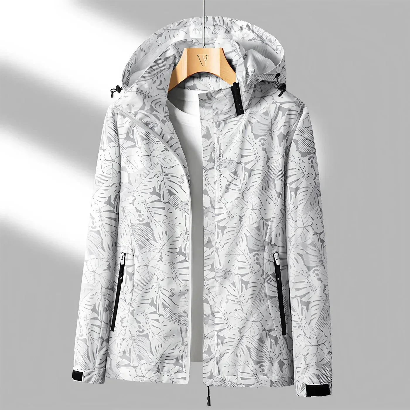 Practical outdoor jacket with hood and stylish print